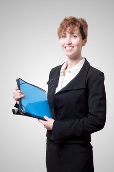 success business woman with briefcase on gray background