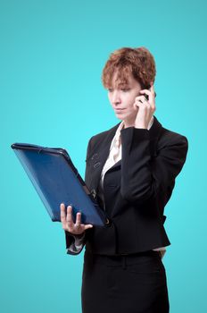 success business woman with briefcase and phone on blue background