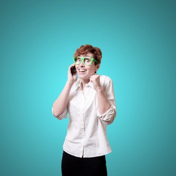 business woman calling on phone on blue background