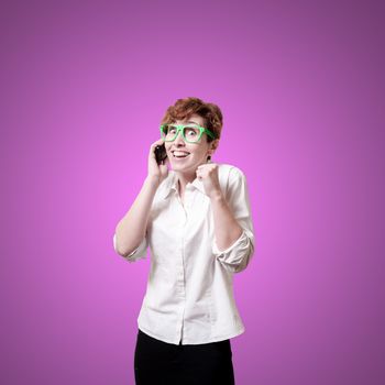 business woman calling on phone on pink background
