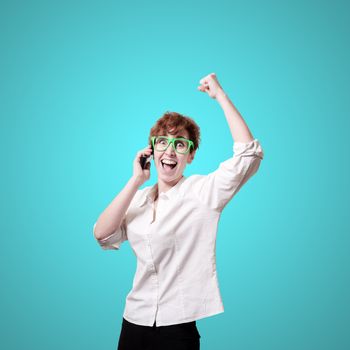 business woman calling on phone on blue background