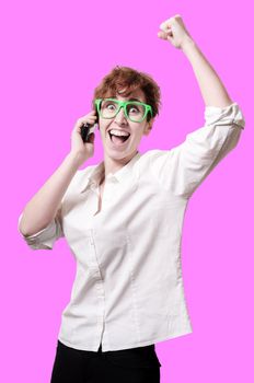 business woman calling on phone on pink background