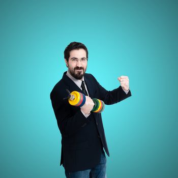 strong business man with weight gym on blue background