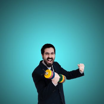 strong business man with weight gym on blue background
