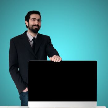 business man and pc monitor on blue background
