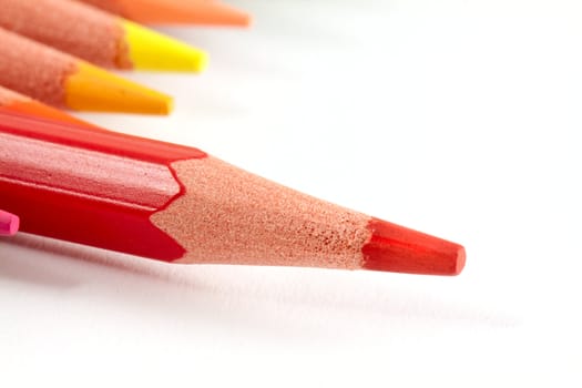 Red pencil with uther isolated on white