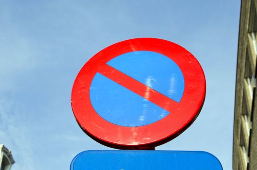 Road restrictive sign not to stand against the sky.