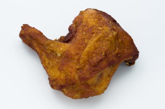 Fried chicken leg and hip on white table