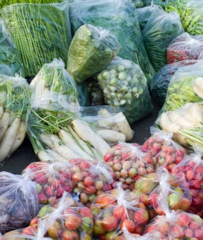 Many kinds of vegetables packed in a plastic bag Available on the market