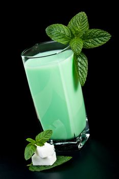 a glass of milk and mint