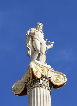 Neoclassical statue of ancient Greek god of the sun, Apollo, outside the Academy of Arts in Athens, Greece.