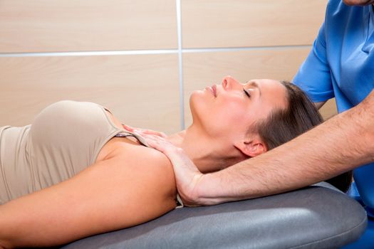 Myofascial therapy technique with therapist hands in woman shoulders