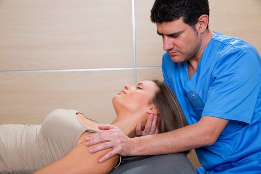 cervical stretching therapy with therapist doctor hands in woman neck