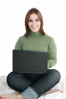 Woman student sitting with laptop isolated on white background