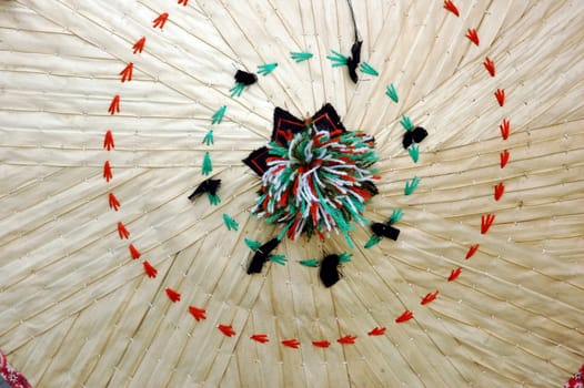 traditional woven hats made of dried palm leaves