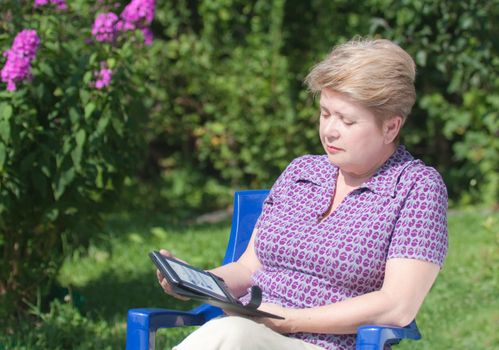 A woman with an e-book