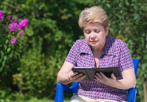 A woman with an e-book