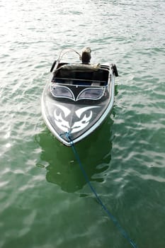 a speedboat at anchor