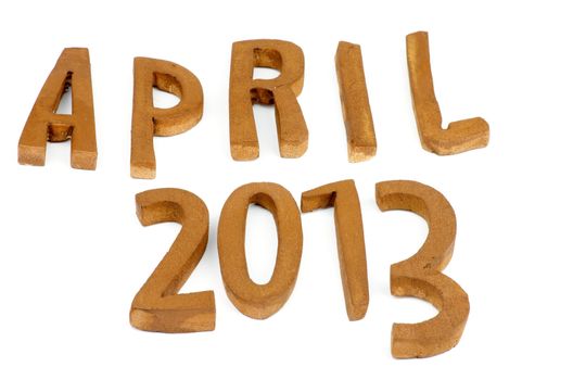 Wooden Handmade Letters "April 2013" isolated on white background