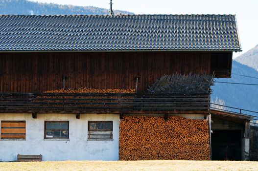 Mountain village in the Alps with traditional buildings