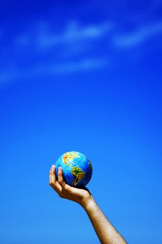 Earth globe in hand protected. Ideal for Earth protection concepts, recycling, world issues, enviroment themes