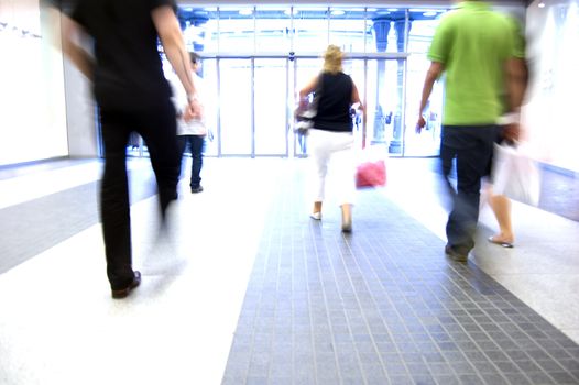 Shopping abstract. People rush motion blurred