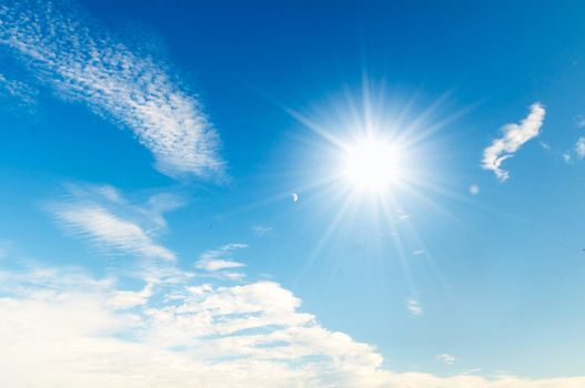 Sunny blue sky with fluffy clouds 