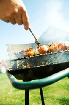 Cooking on the barbecue grill. Outdoor weekend time