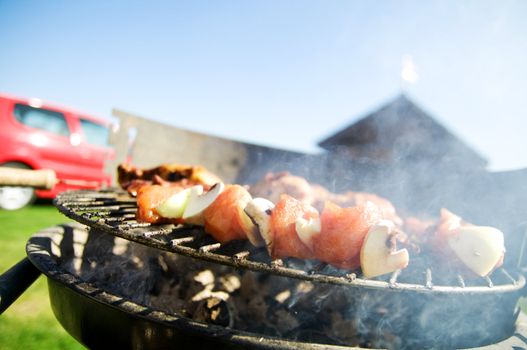 Cooking on the barbecue grill. Outdoor weekend time