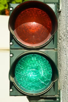 Garage traffic lights with the green light on. Free to enter.