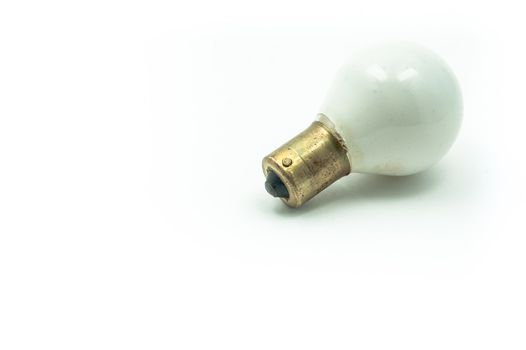 A small white bayonet bulb at the studio