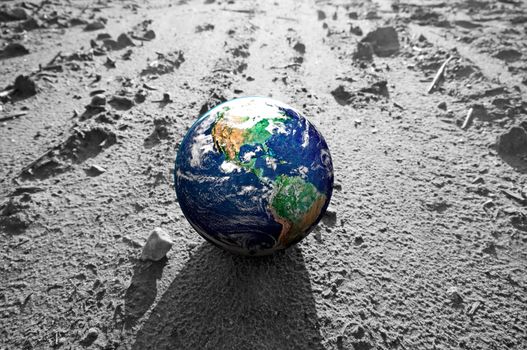 The Earth globe on rocky Mars like surface. Concepts of Earth protection, environment, global warming, disasters etc. 