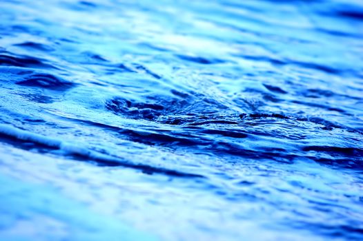 Blue, crystal water twirling, background
