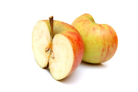 Two apple halves isolated on white