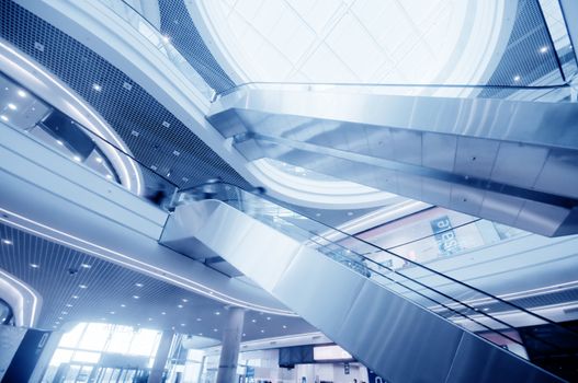 Modern shopping center. The escalators