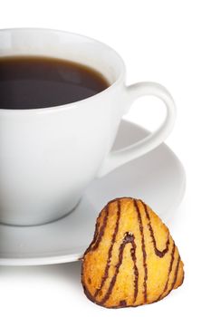 Cup of coffee with heart shaped cookies over white background