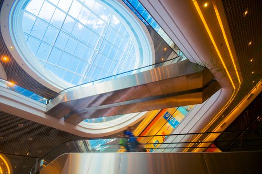 Modern shopping center. The escalators