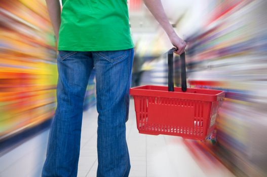 Customer in supermarket. Motion blur conceptual