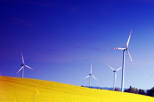 Wind turbines. Energy. Beautiful meadow
