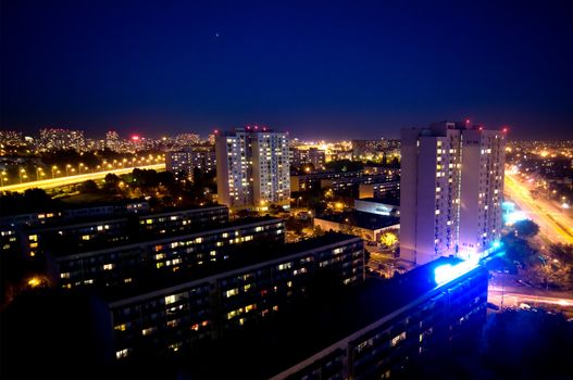 District of a big city at night.