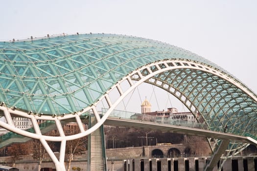 Peace Bridge - a pedestrian bridge on the Kura River in Tbilisi, Georgia