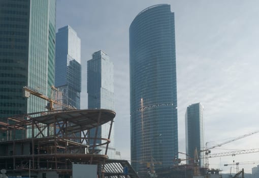 construction of office buildings Moscow business center on a winter day