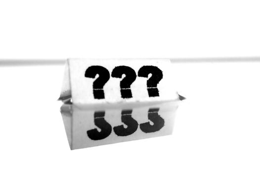Card floating on water surface with printed: ???