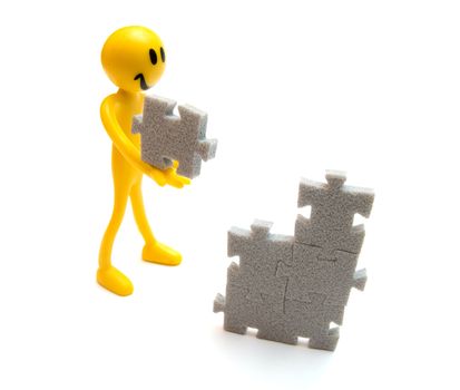 Putting pieces of puzzles together. Conceptual image