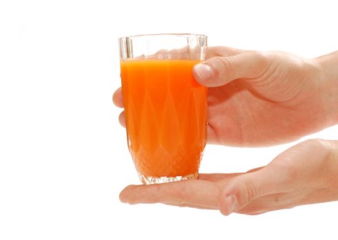 Hand holding a glass of fruit juice. Isolated on white