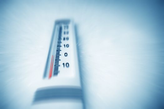 Below zero. Thermometer indicating minus temperature in cold winter.