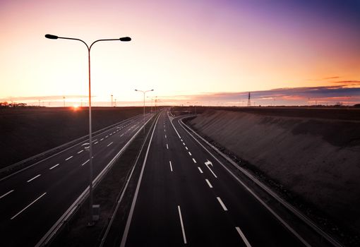 Highway at sunset. Top view