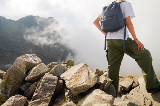Active tourist in mountains. Body close-up