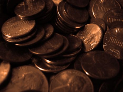 A macro of a pile of copper pennies.