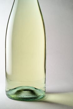 White wine bottle closeup back lighted 